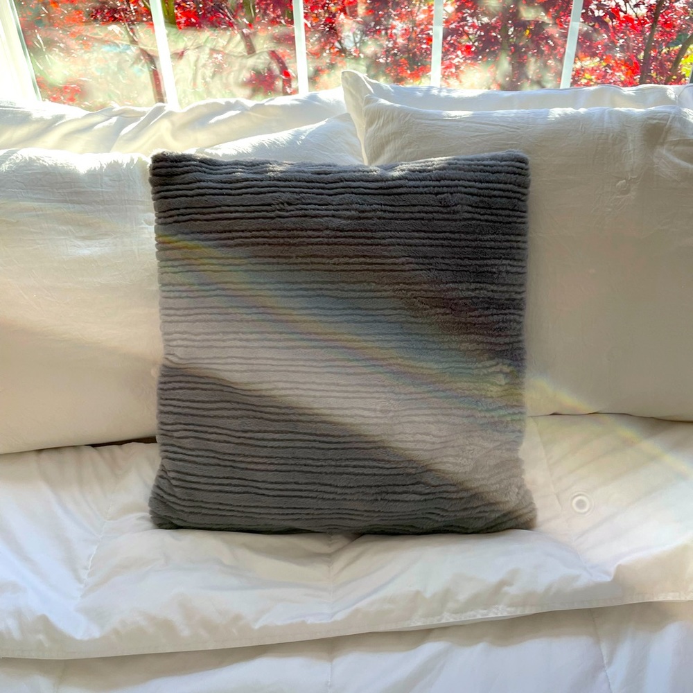 Grey fuzzy pillow